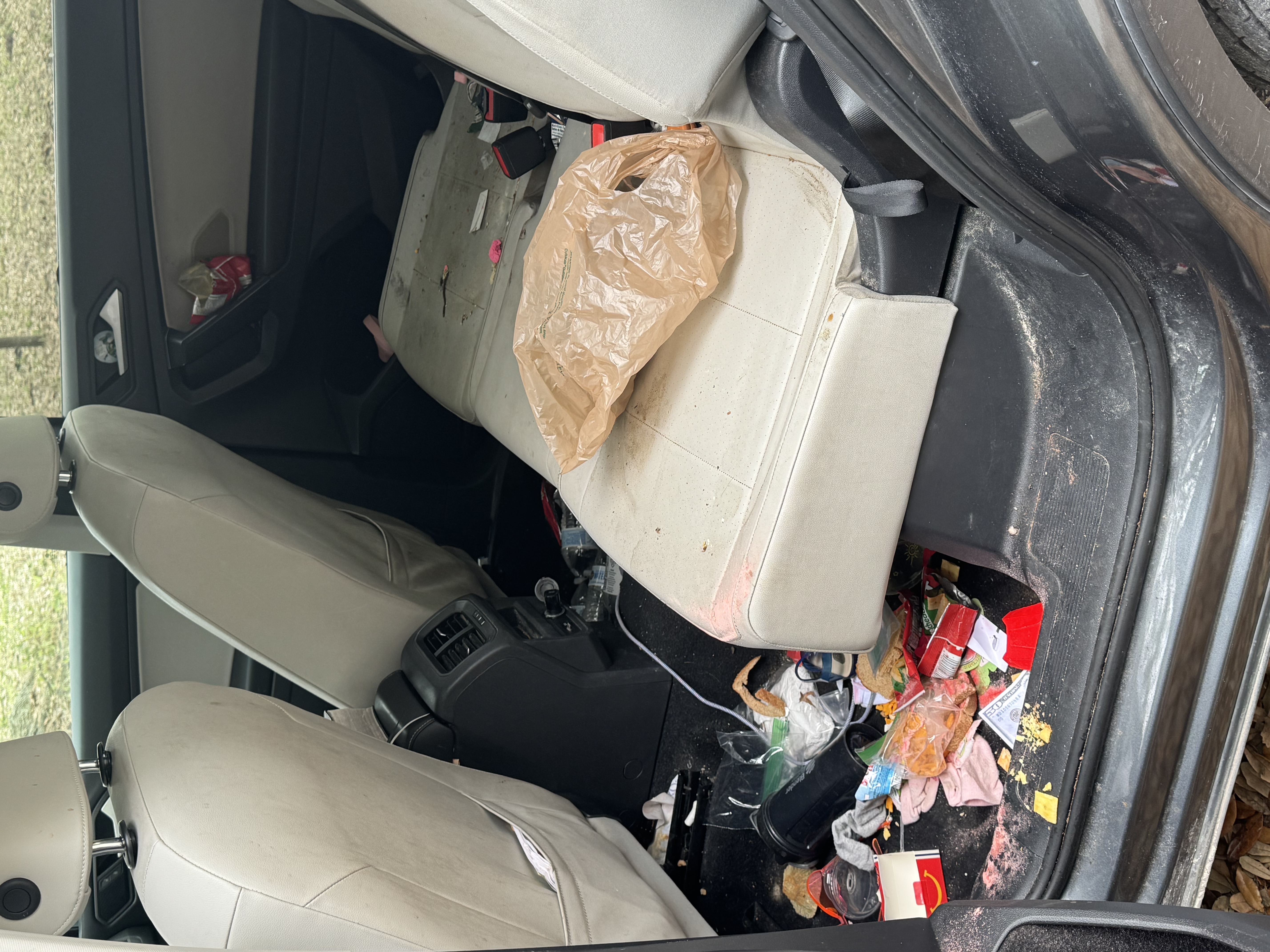 Volkswagen Tiguan rear seat before mobile detailing service