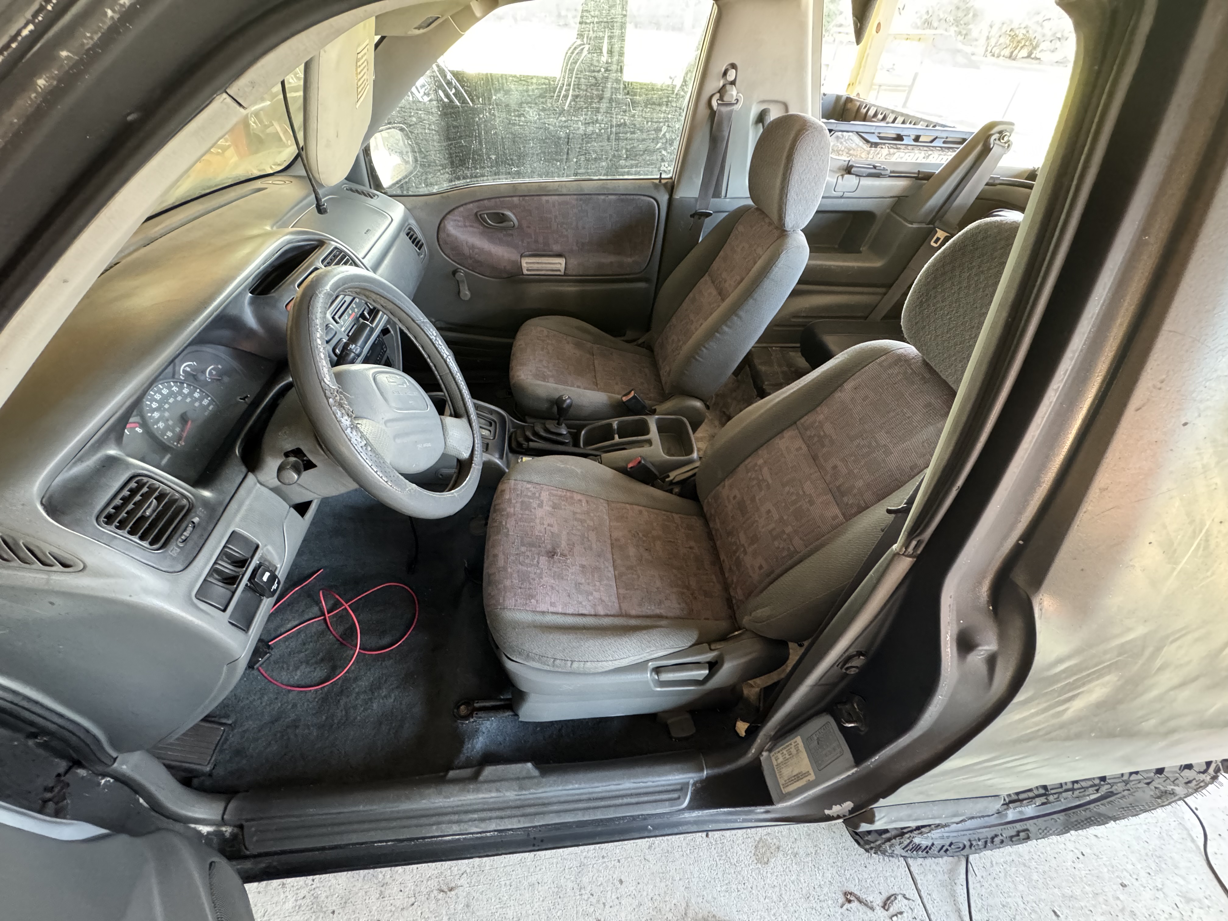 Suzuki Tracker driver area after interior detailing