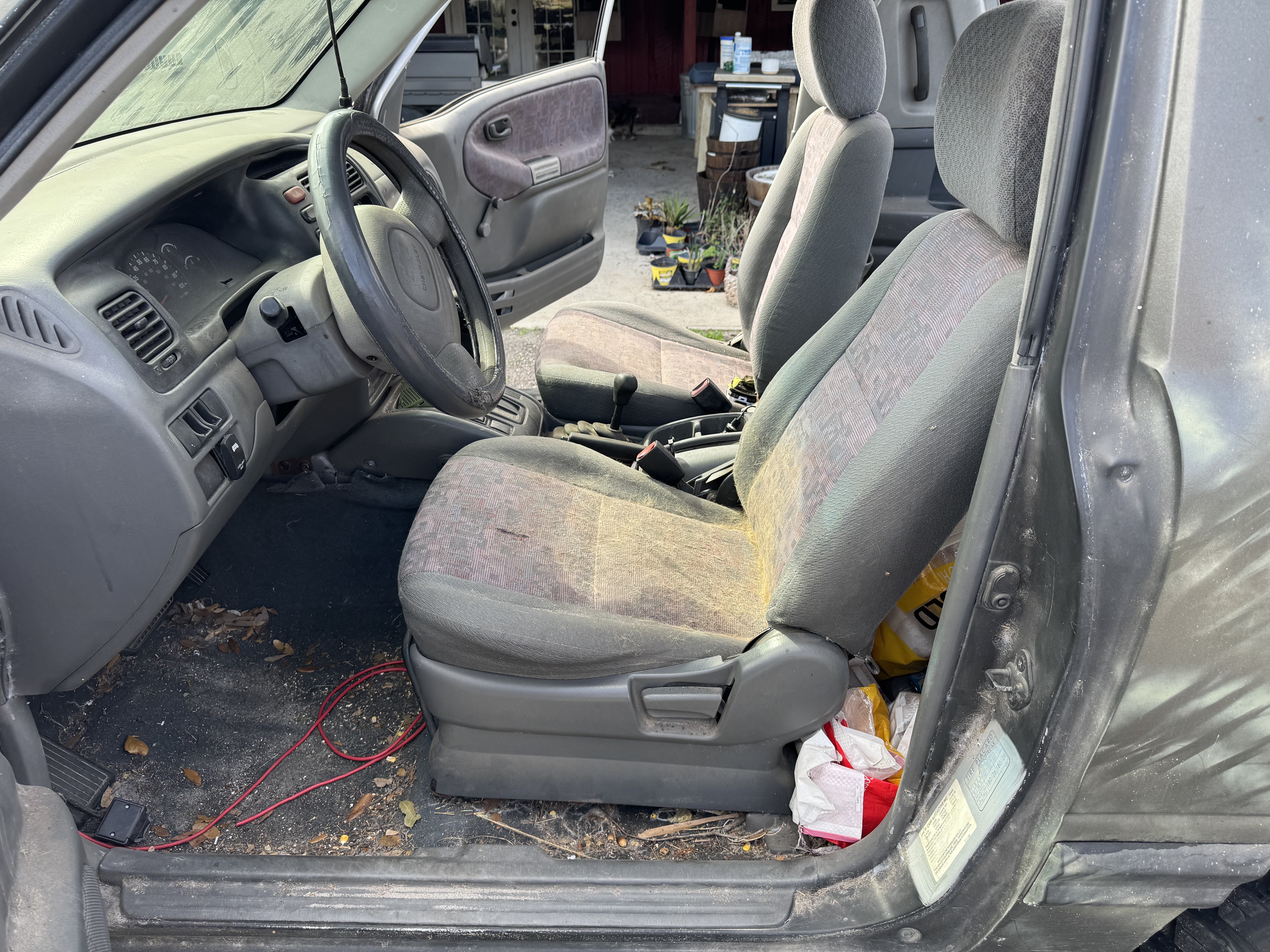 Suzuki Tracker driver area before interior detailing